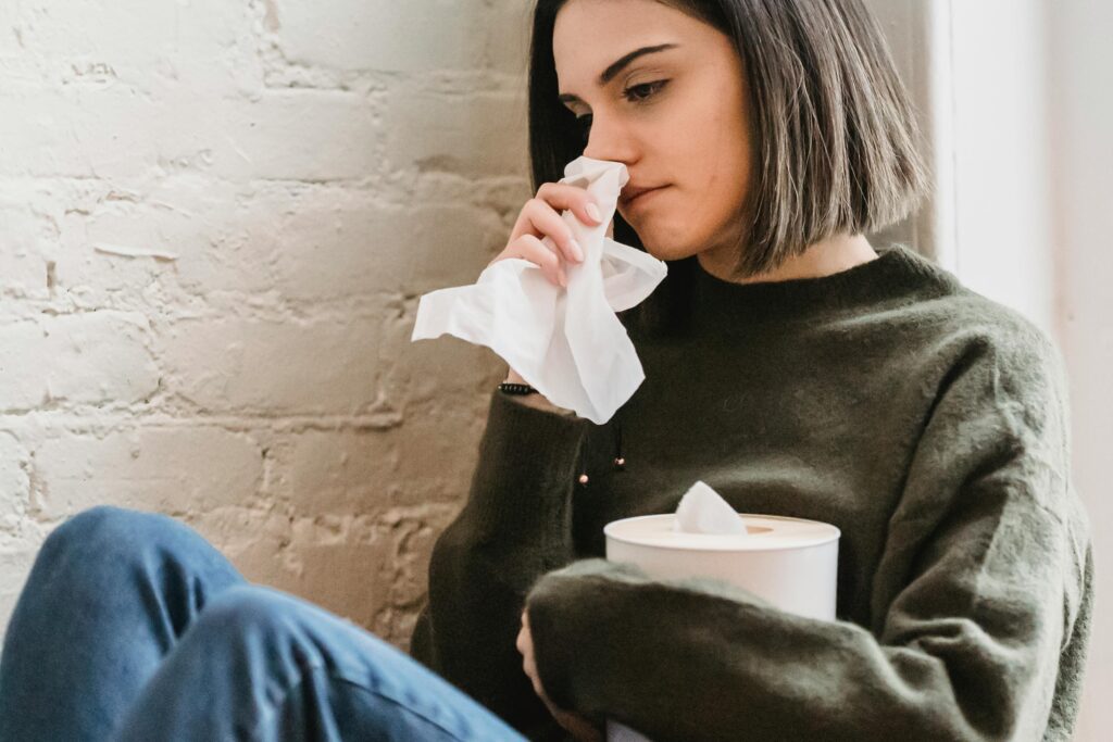 A girl crying unsure if it's grief or anxiety