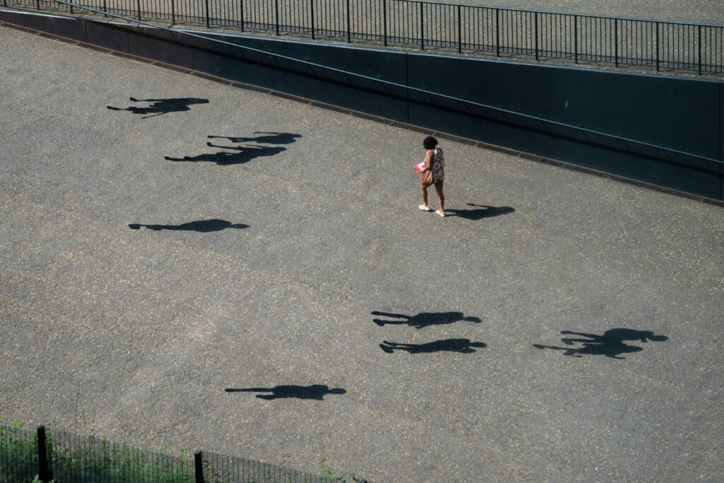 Shadows following someone showing signs of unresolved trauma