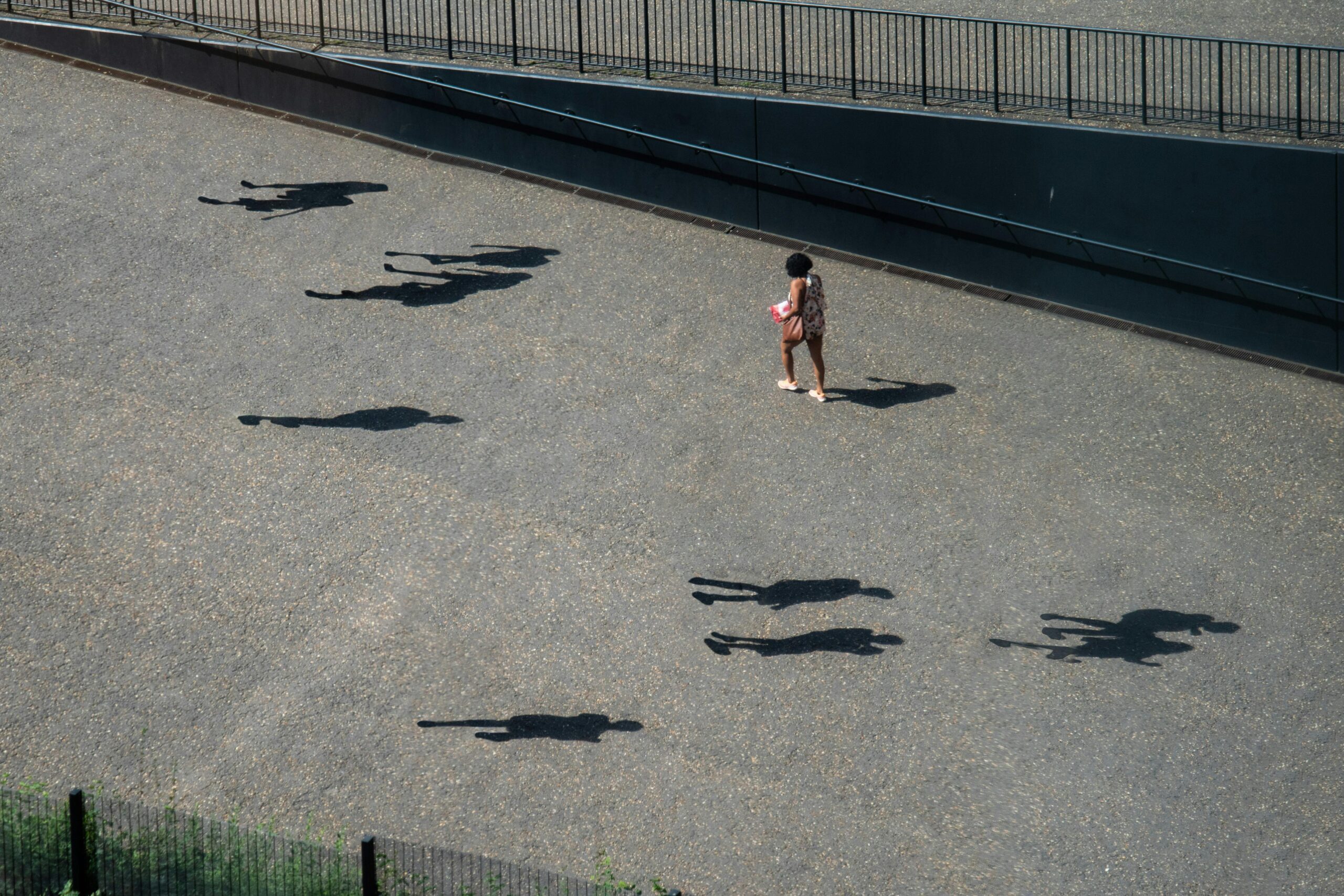 Shadows following someone showing signs of unresolved trauma