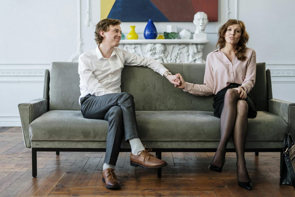 A couple in a Gottman method couples therapy session